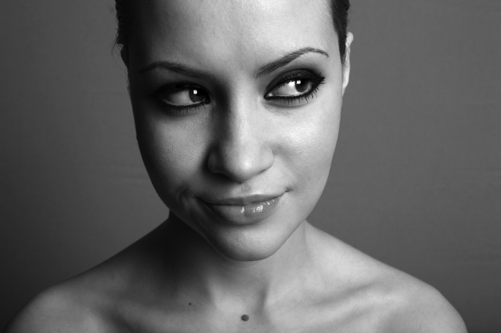 Black and white portrait of young pretty woman.